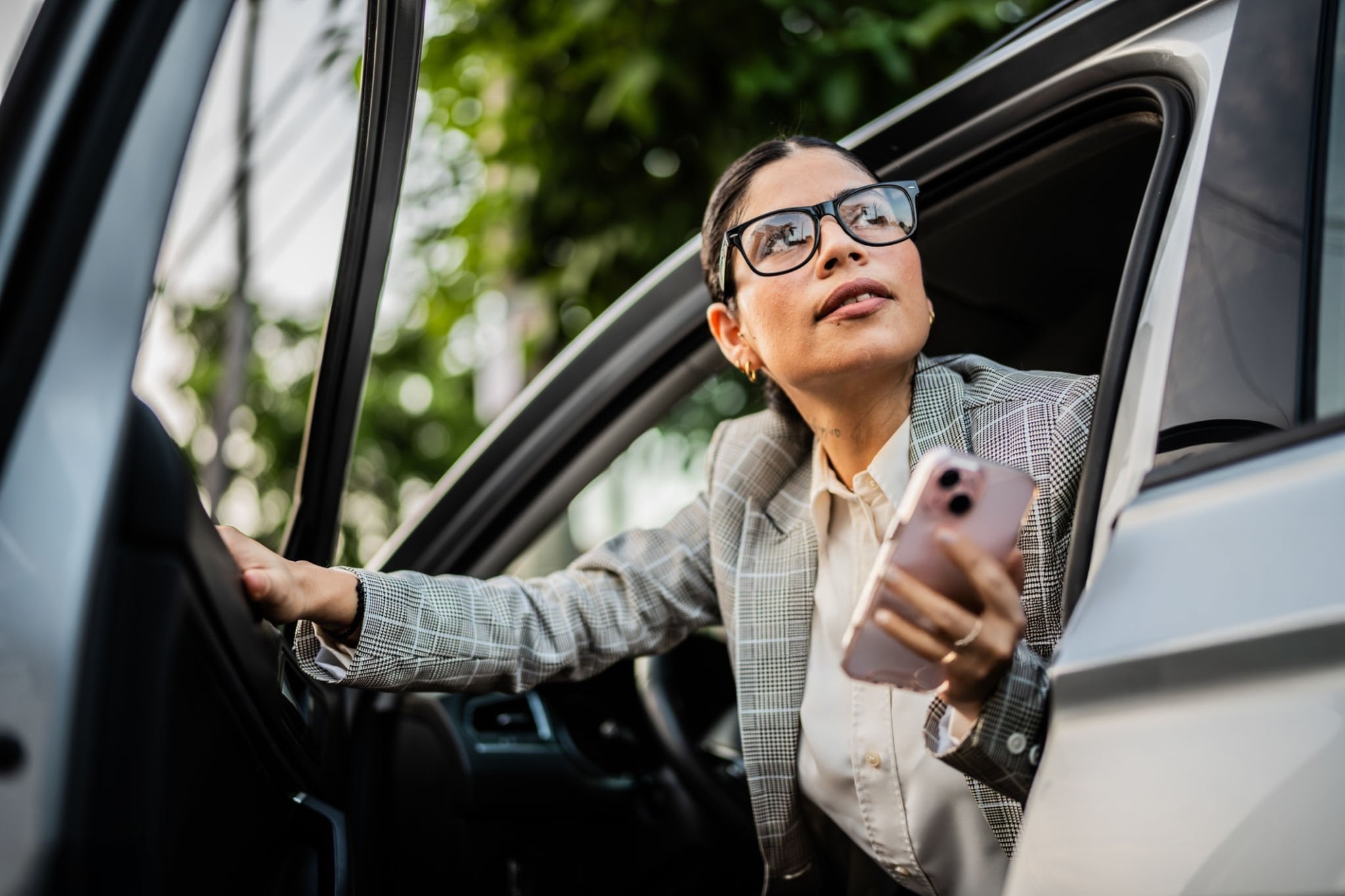 female parent getting out of the car.